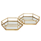 Two gold-toned hexagonal trays shown apart on a white background, with reflective bases and open perimeter rails.