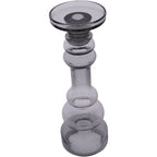 Large glass candle holder viewed from above at an angle, showing the round platform and central recess.