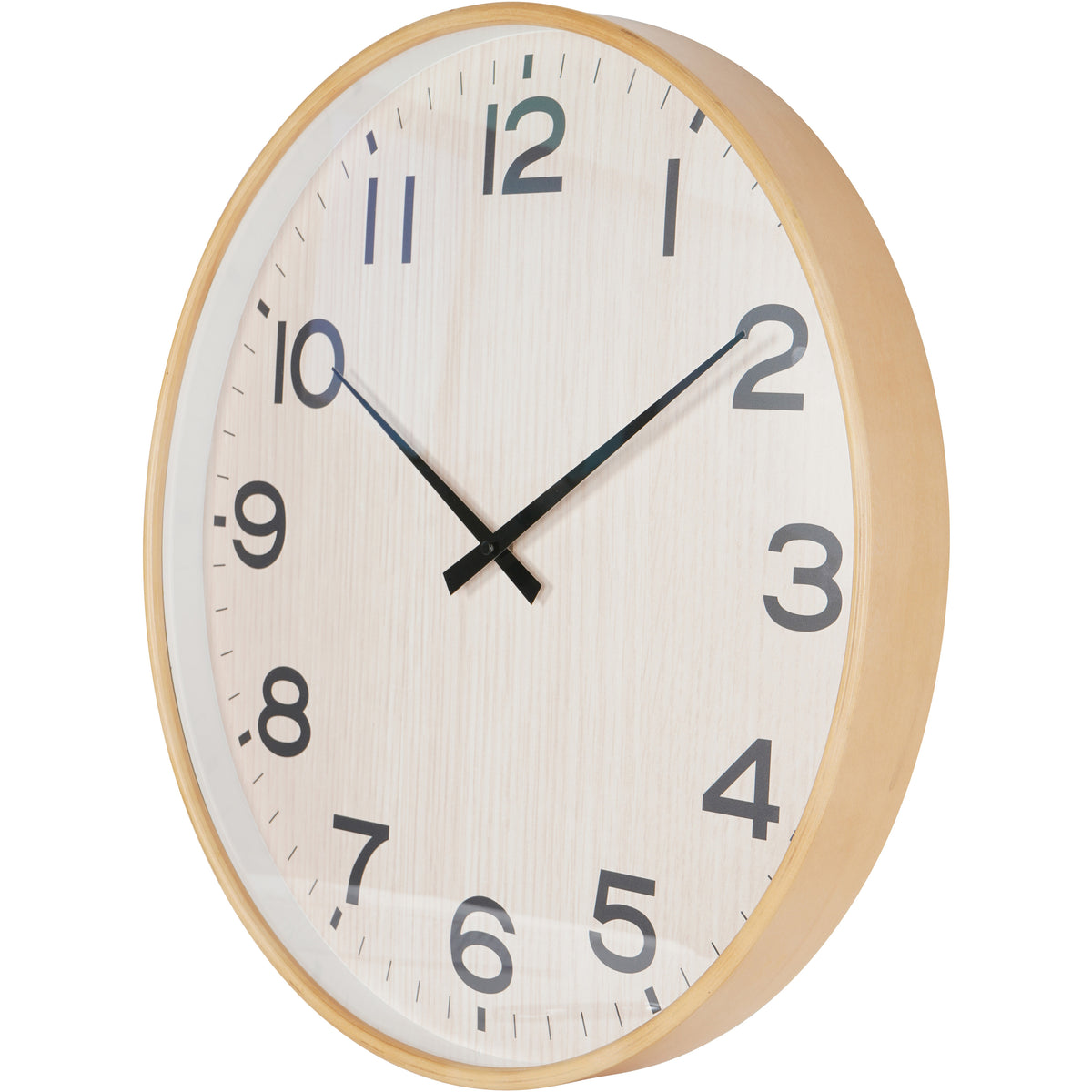 Angled view of the wall clock showing the depth of its natural-toned frame and the glass over its numbered dial.