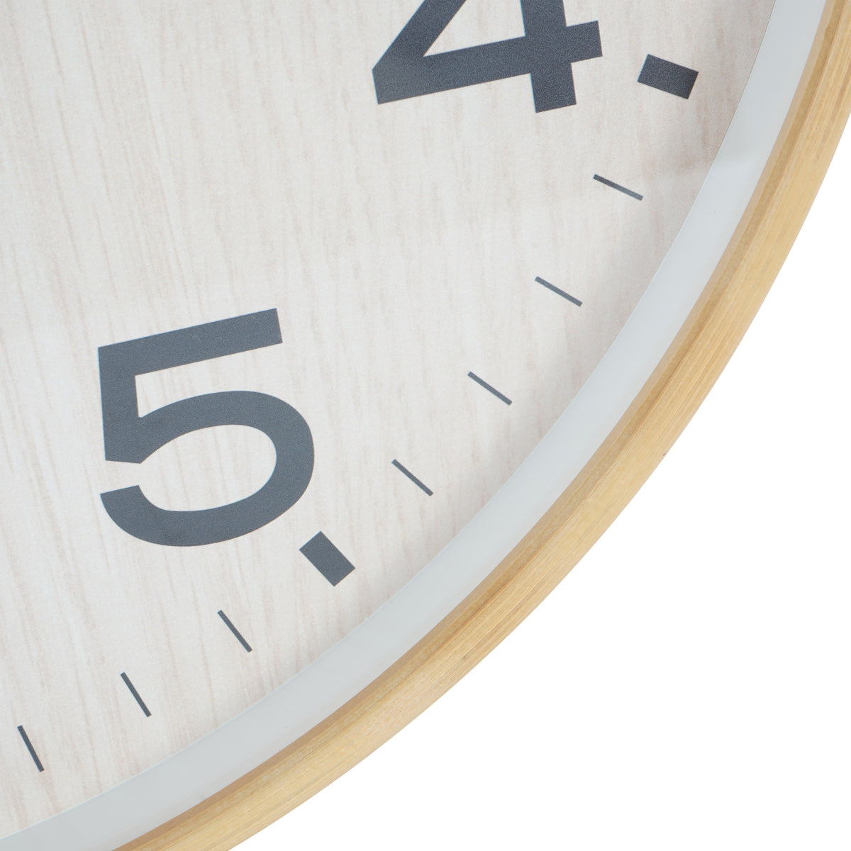 Close-up of the clock dial around the numerals four and five, with minute markers, pale grain pattern and curved outer rim.