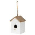 Three-quarter view of an off-white birdhouse-shaped ornament with a brown pitched roof, arched opening, pale perch and long tan rope loop.