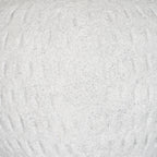 Detail of the vase's pale granular surface, with fine grey speckles and irregular shallow vertical strokes.