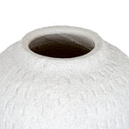 Close-up of the vase's wide circular mouth and sloping shoulders, showing the speckled rim and shadowed interior.