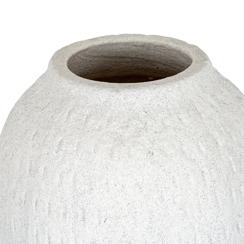 Close view of the vase's broad open mouth and short neck, showing grey speckles across the shoulders.