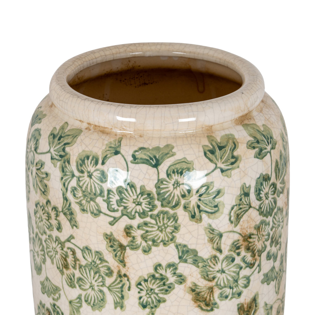 Close view of the vase opening and rolled rim, showing fine crackle lines, tan markings and green floral decoration below the shoulder.