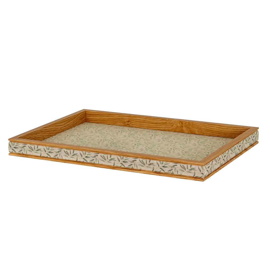 Green Leafbase Tray at a low angle, showing its pale leaf-patterned base and darker patterned front and side bands.