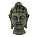 Front view of the green Buddha head sculpture showing its calm face, symmetrical elongated ears and curled topknot.