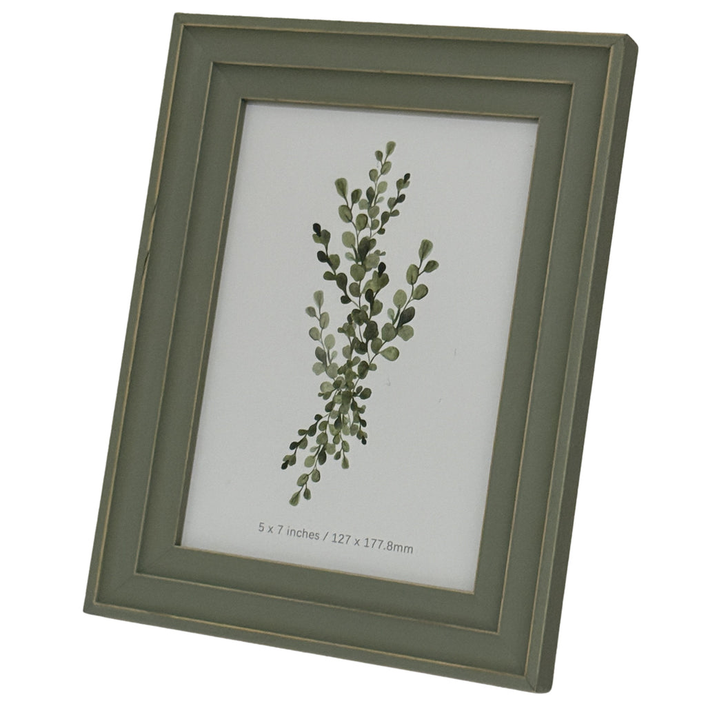 Angled view of the green-grey photo frame showing its squared layered border, gold-tone outlines and leafy botanical insert.