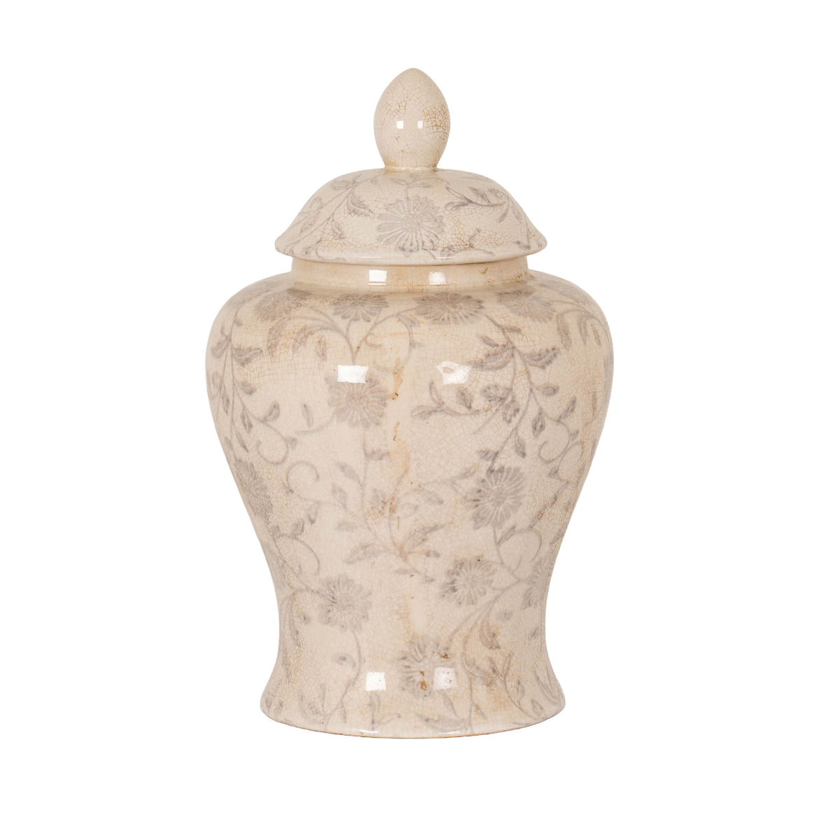 Pale ginger jar with grey flowers and curling stems, rounded shoulders, a flared foot and a domed lid topped by a pointed finial, against a white background.