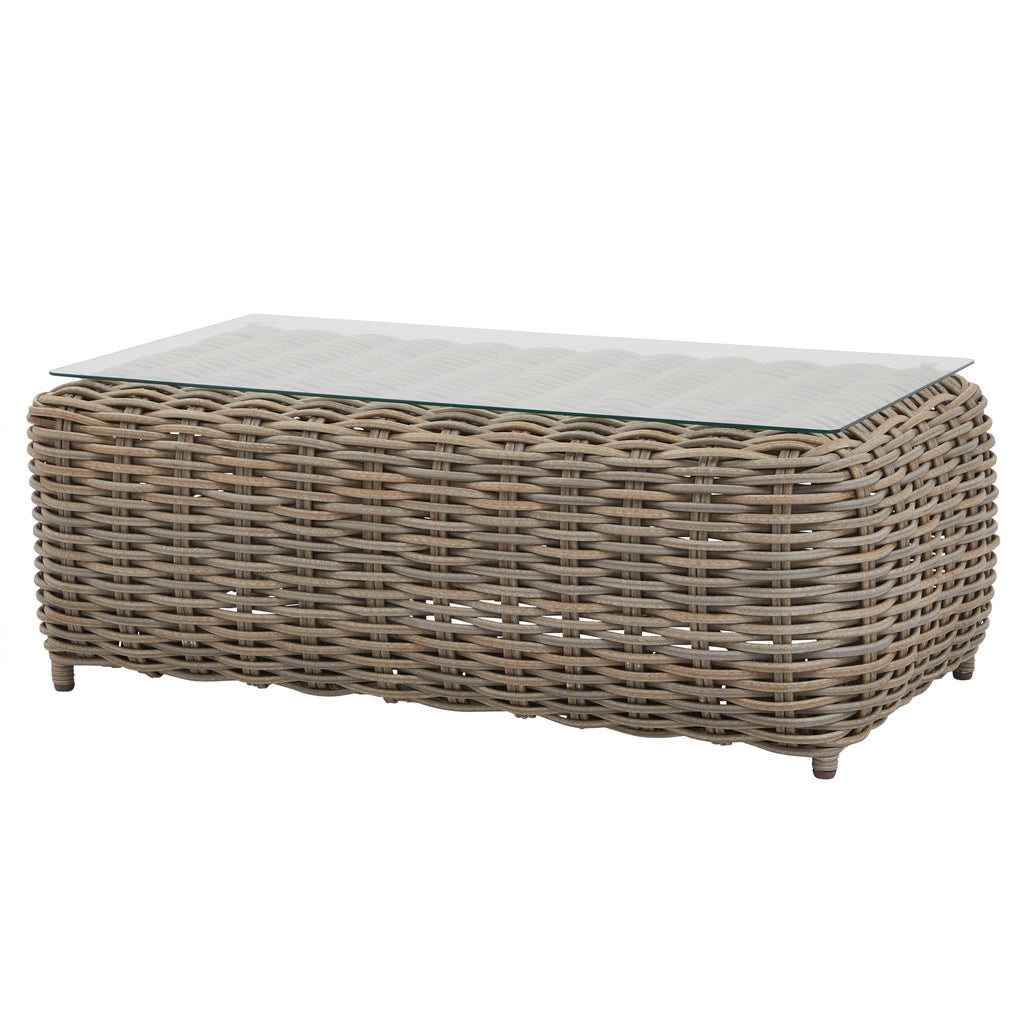 Low rectangular table with rounded grey woven sides and a transparent-looking top through which the weave is visible.