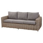 Front angled view of a grey woven sofa with rounded arms and three pale grey seat and back cushions against a white background.