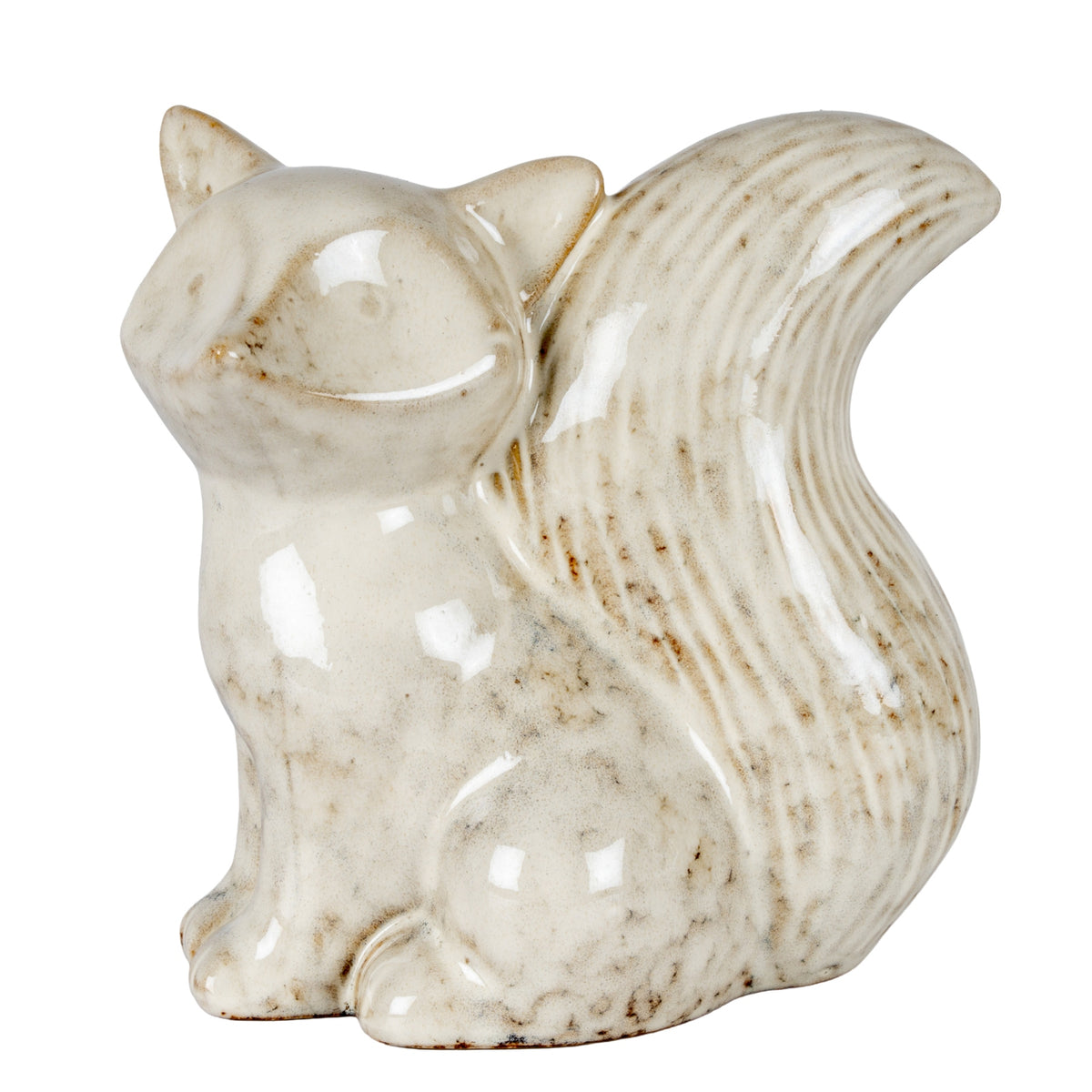 Glossy cream-white seated fox ornament looking left, with upright ears, rounded paws and a large grooved tail curling upwards against a white background.