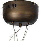 Close-up of the rounded bronze-coloured ceiling rose with fine streaks across its finish and suspension cords below.