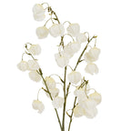 Upper branches of the artificial spray, showing numerous white lantern forms hanging at different heights from curved green stalks.
