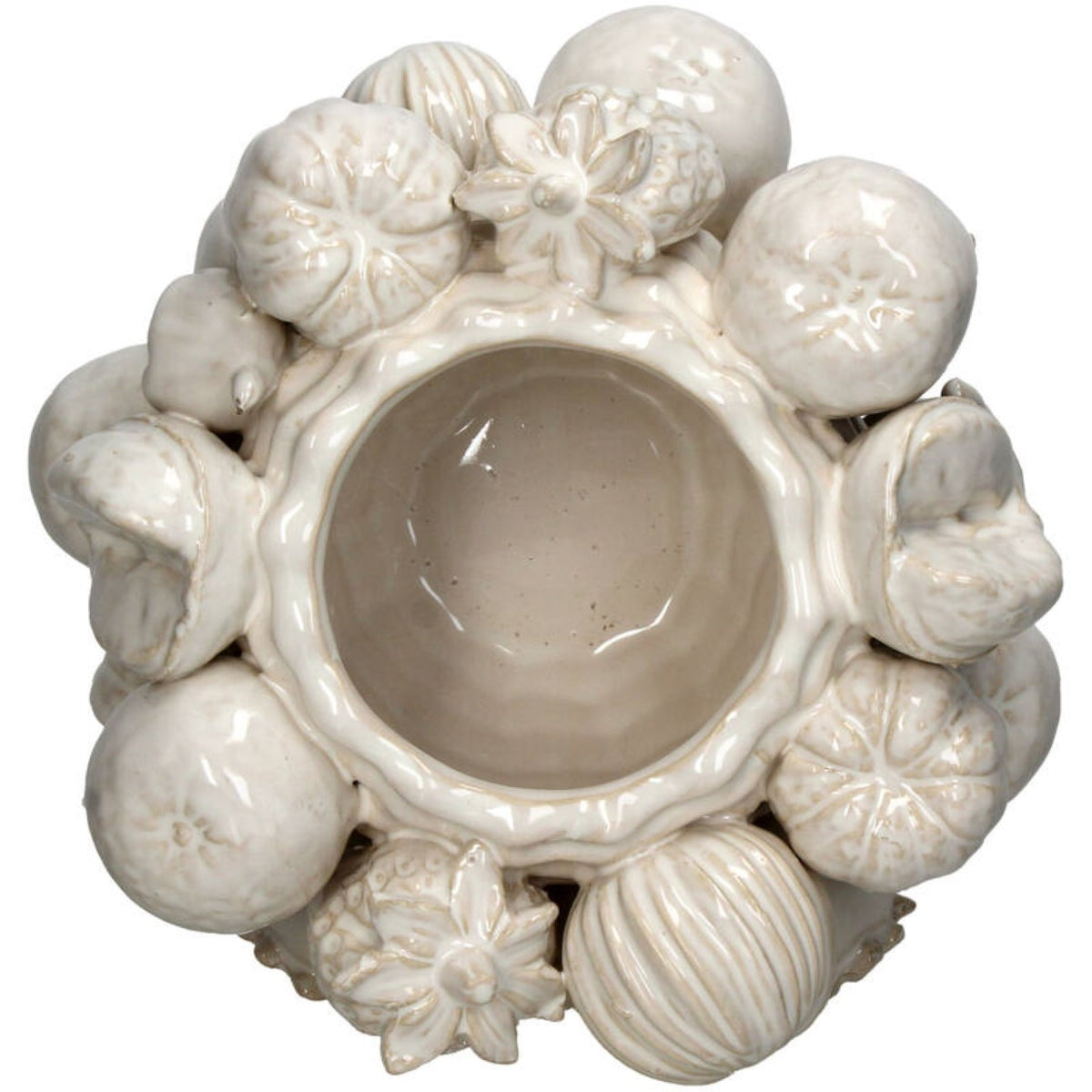 Overhead view of the vase showing its circular glazed interior surrounded by sculpted fruit shapes.