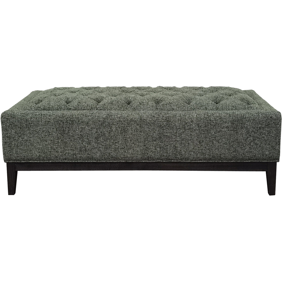 Front view of the green rectangular ottoman with a deeply buttoned top, piped edges and dark wooden base against white.