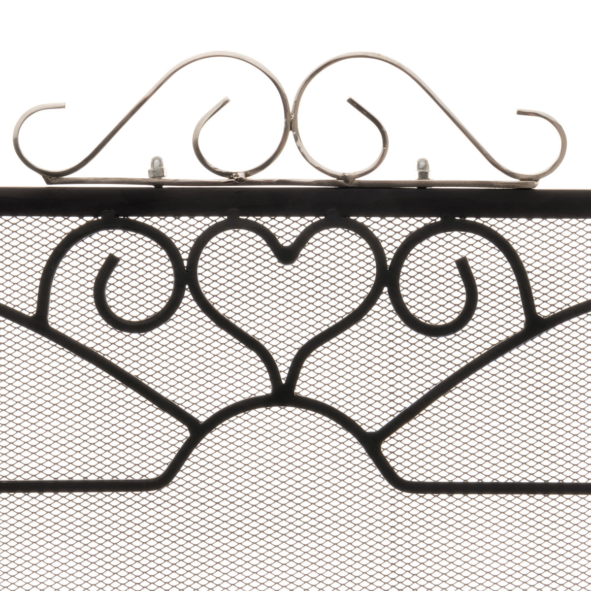 Close-up of the fire screen's silver-toned scroll crest above a black heart motif and fine diamond-patterned mesh.