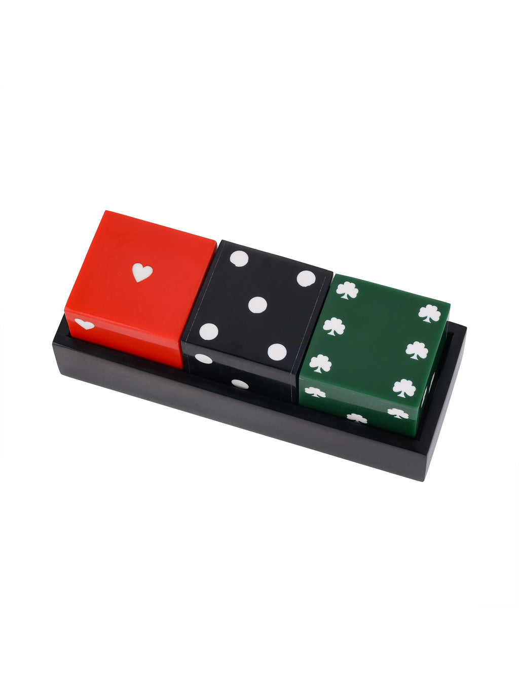 Angled view of red, black and green decorative dice with white hearts, dots and shamrocks, arranged in a black rectangular tray.