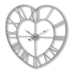 Front view of the silver-toned Heartframe Wall Clock, with Roman numerals between two open heart outlines.