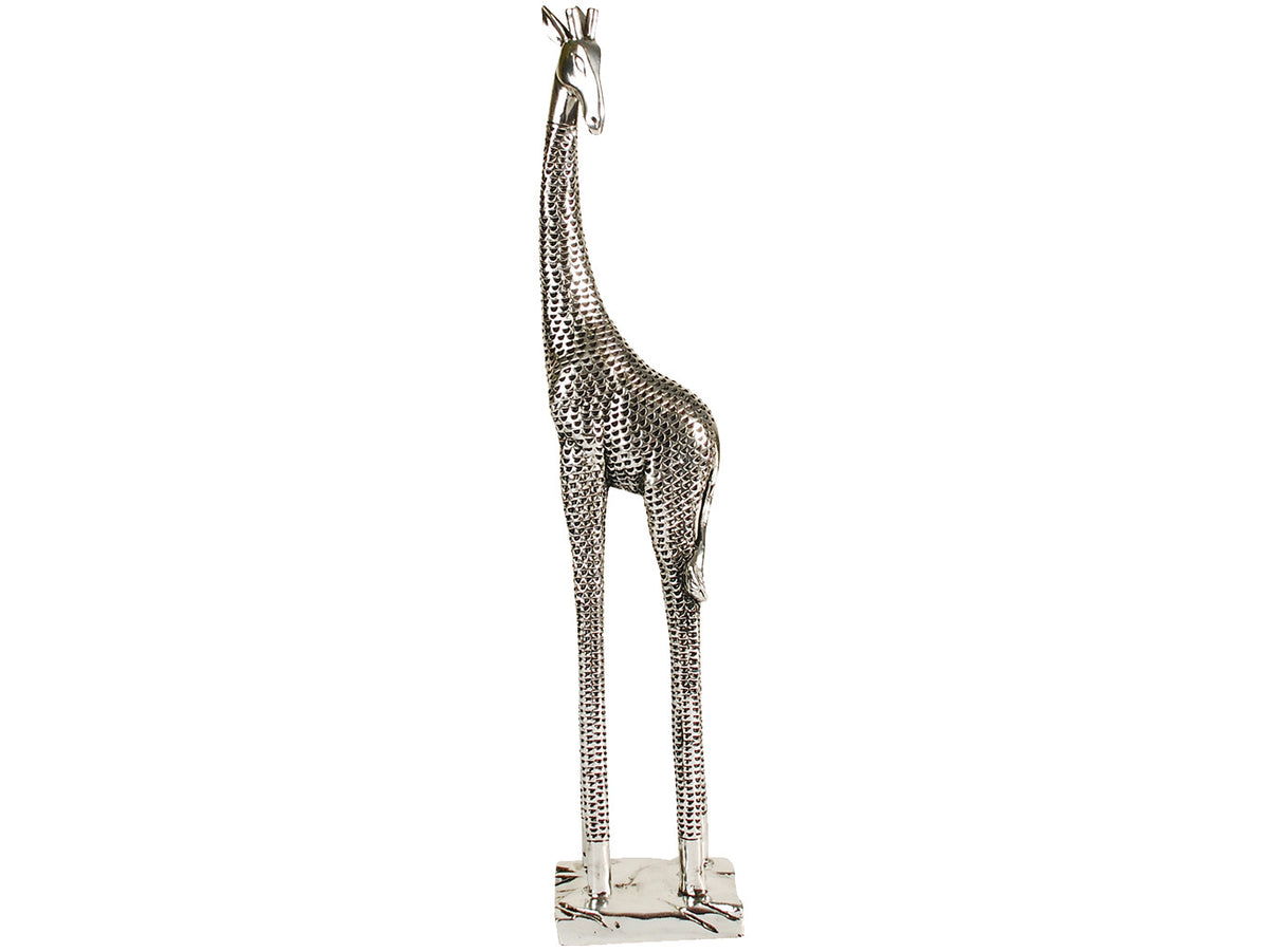 Full-length silver giraffe sculpture with dark crescent-shaped markings, elongated legs and a rectangular base against white.