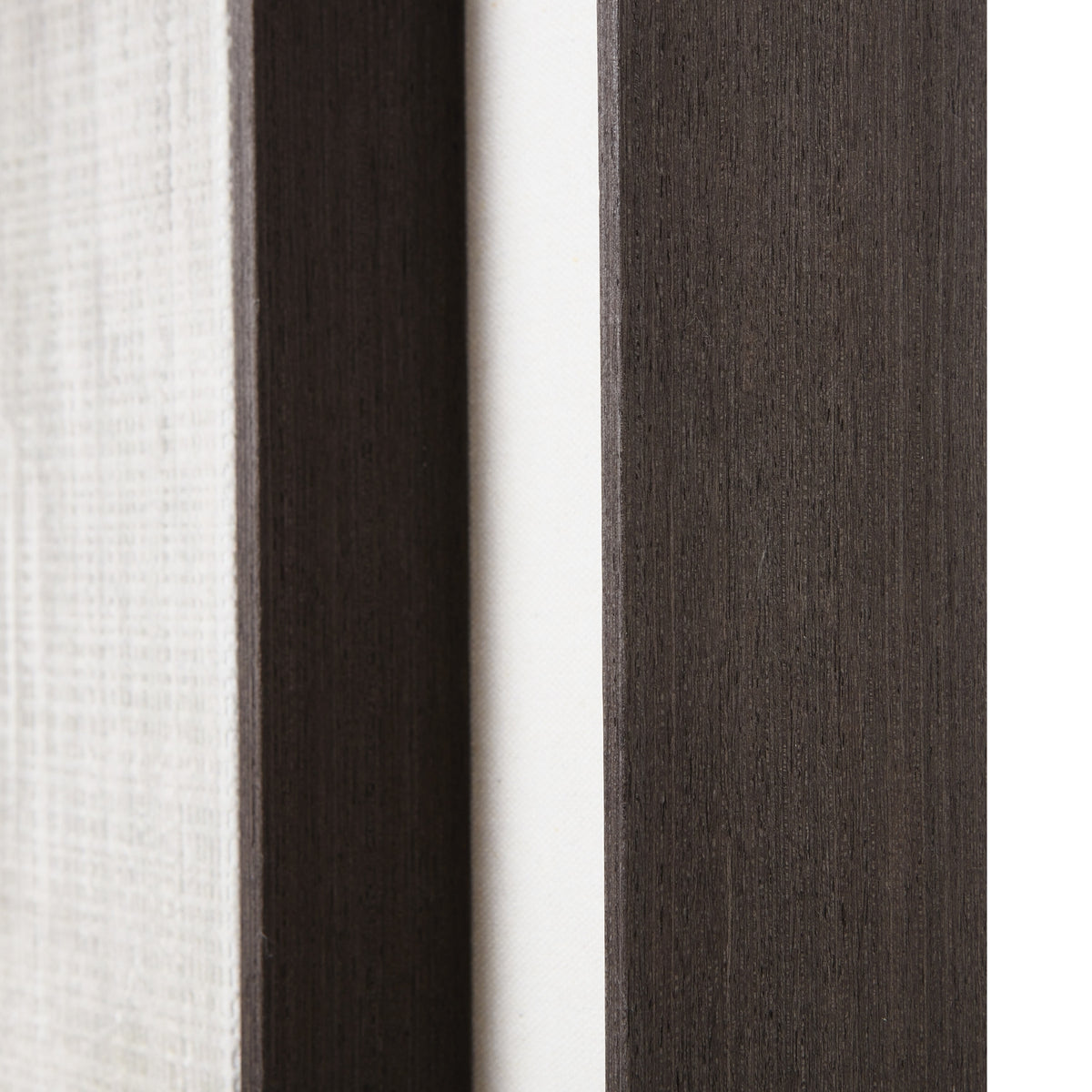 Detail of the dark inner and outer frame edges with a pale mount between them and fine crosshatched texture visible on the artwork.
