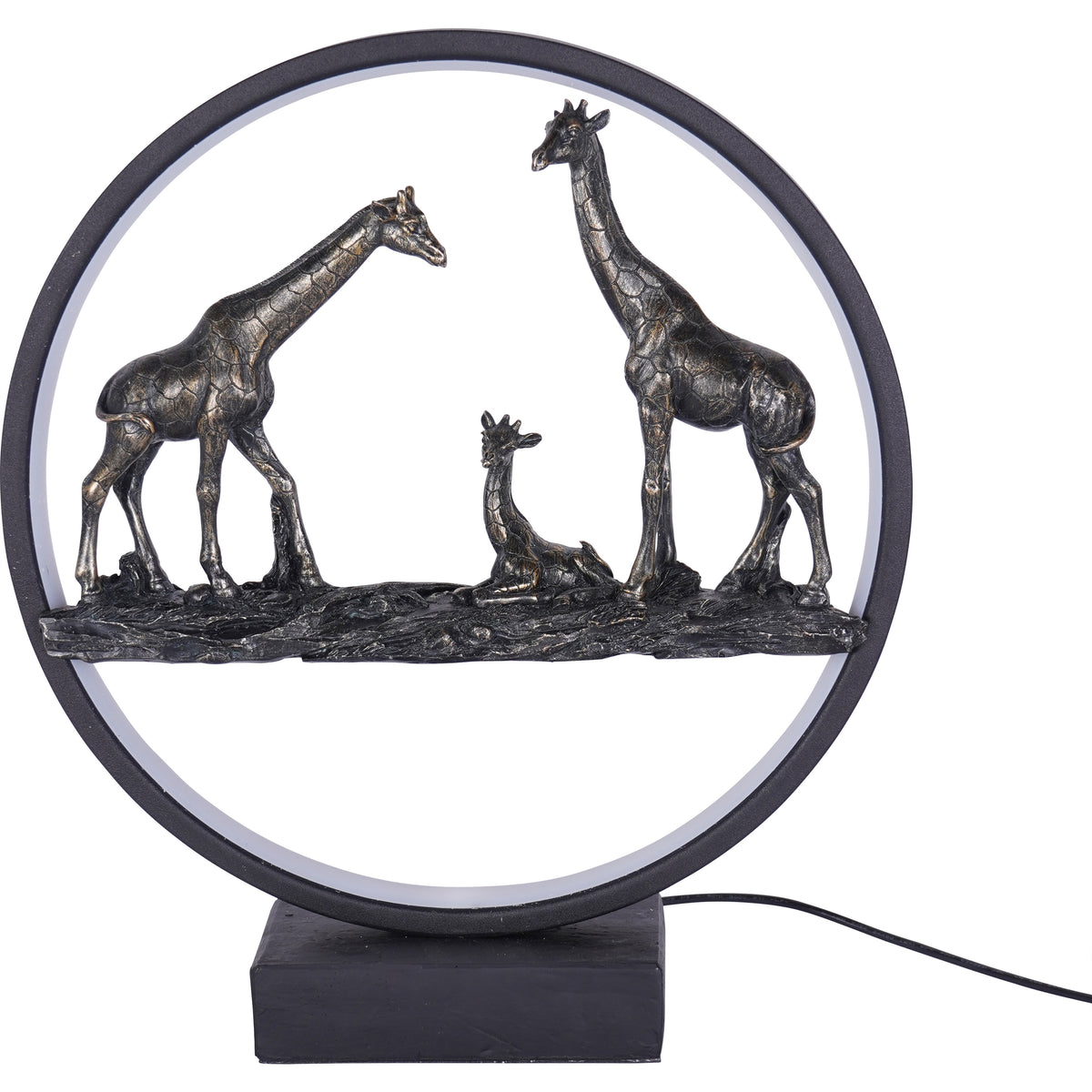 Front view of three bronze-toned giraffes within a black circular frame with a pale inner light band and rectangular base.