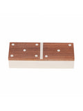Closed rectangular storage box viewed from slightly above, with visible grain on the wooden lid, pale domino-style dots and a central dividing line.