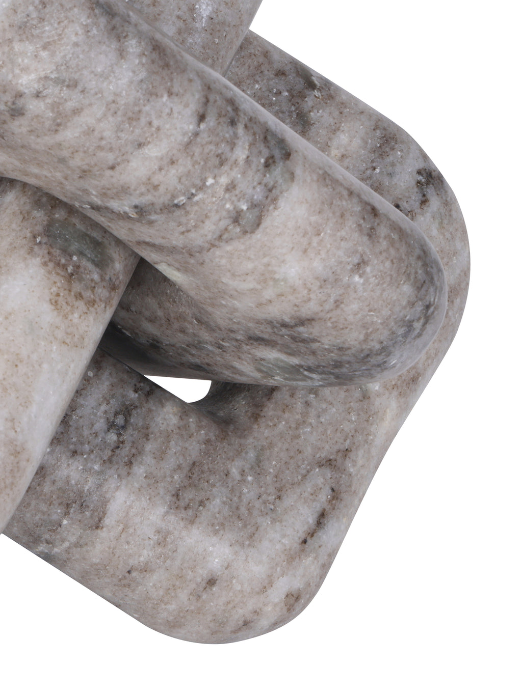 Detail of the knot sculpture's curved marble surfaces and a small opening between two interlocking loops.