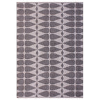 Full view of a rectangular rug with grey stepped geometric shapes and small diamonds against an ivory background.