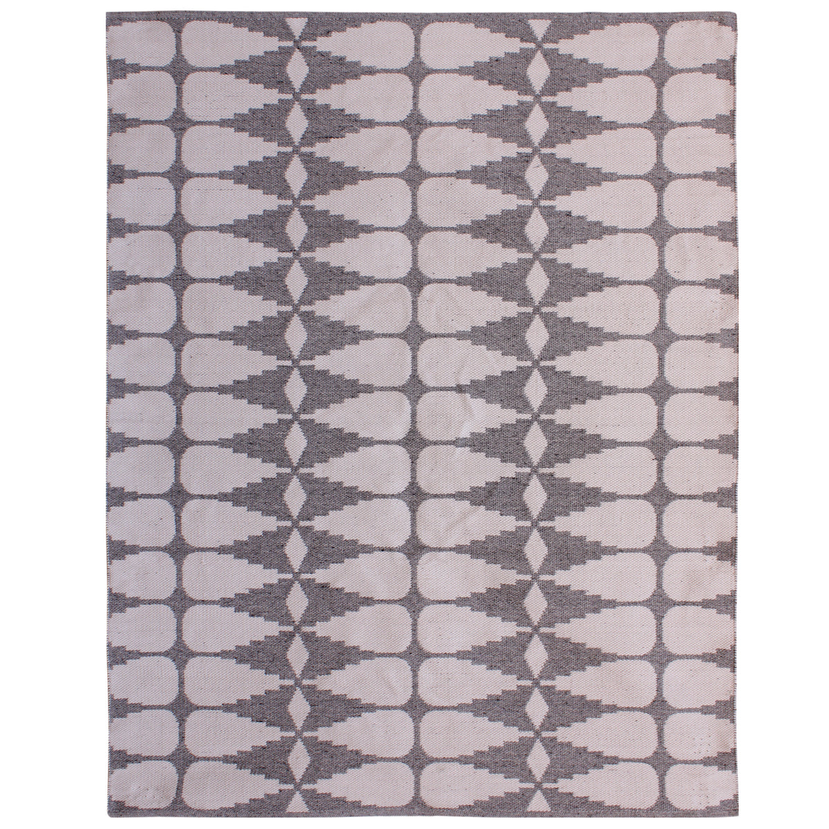 Full view of the rug's reverse, with ivory interlocking shapes and diamonds against a grey background.