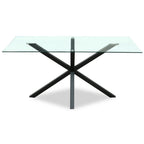 Intersecting Barbase Dining Table on a white background, with a clear rectangular top above black diagonal and upright bars.