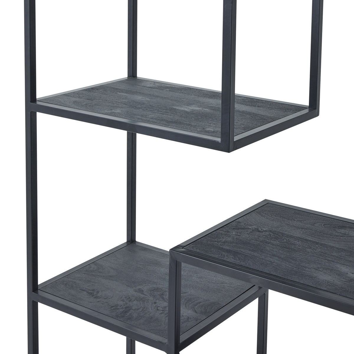 Close view of staggered dark shelves showing grain-like markings, inset edges and slim black rectangular framing.