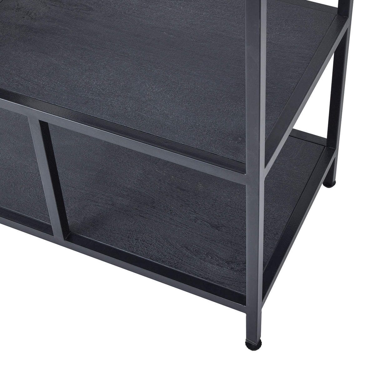 Lower corner of the shelving unit showing two textured dark shelf surfaces, square-section black framing and small round foot pads.