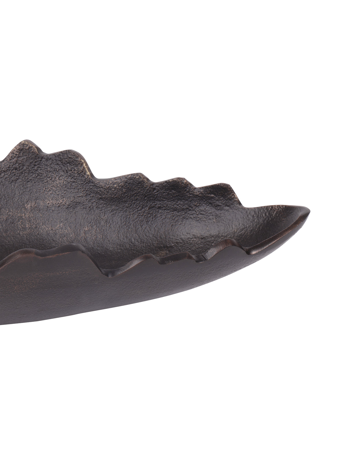 Close-up of the dish interior and side, showing the grainy antique black finish and bronze-toned accents along the uneven rim.