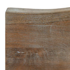 Close-up of the tabletop's brown grain and pale surface highlights, with a gently curved edge along the top of the image.