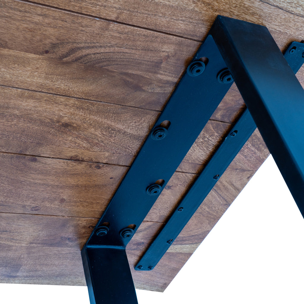 Underside detail showing grain-patterned panels, a black frame attachment with visible bolts, and a narrow black strip alongside it.