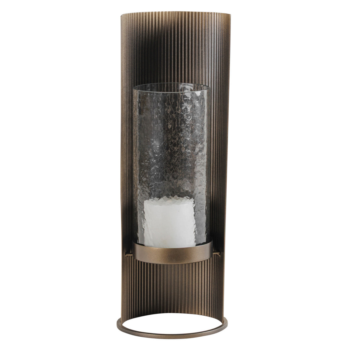 Aged gold candle holder with a white pillar candle inside a hammered glass hurricane, framed by a curved ribbed backplate.