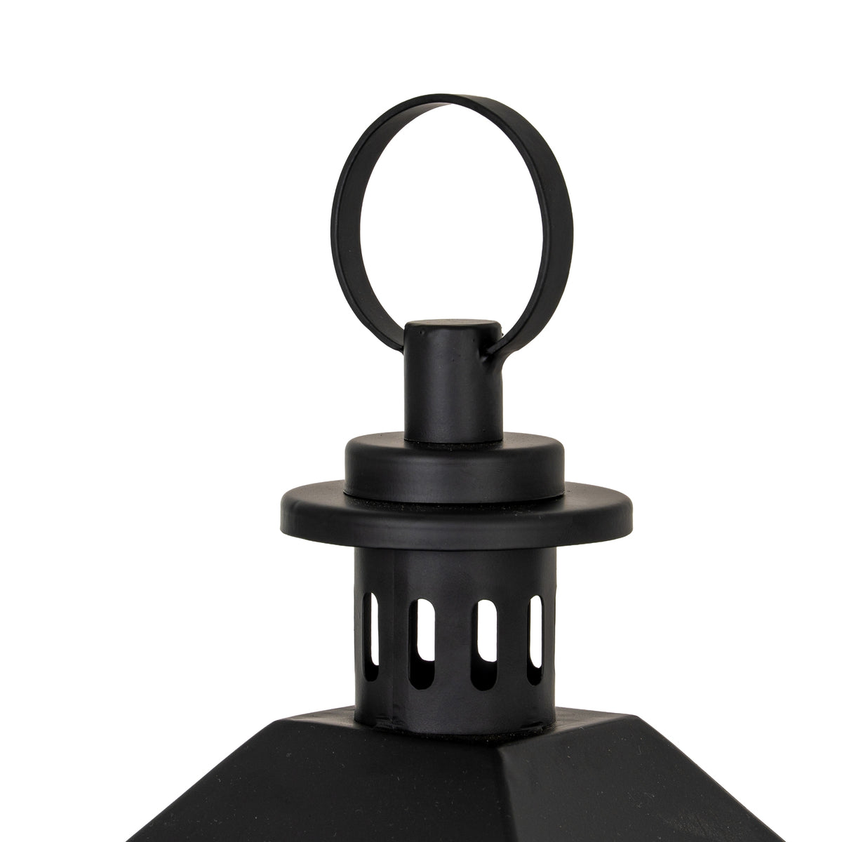 Detail of the black circular top ring, stepped round sections and elongated openings above the lantern roof.