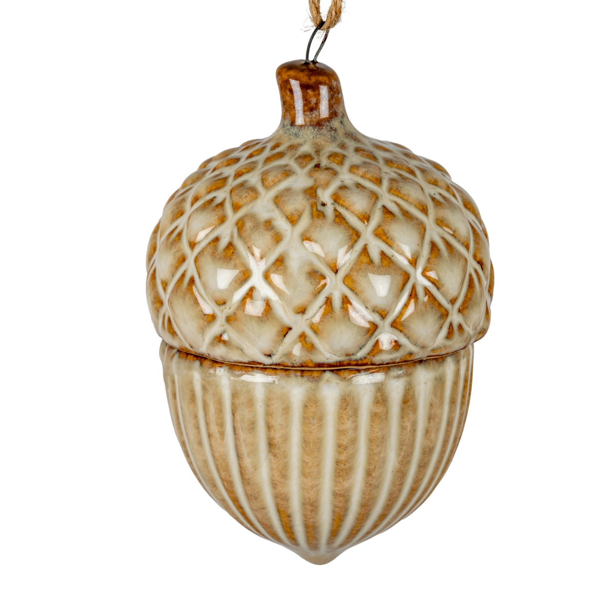 Close-up of the glossy acorn-shaped ornament showing raised cream latticework, mottled ochre-brown colouring, vertical ribs and a brown neck with a dark attachment loop.