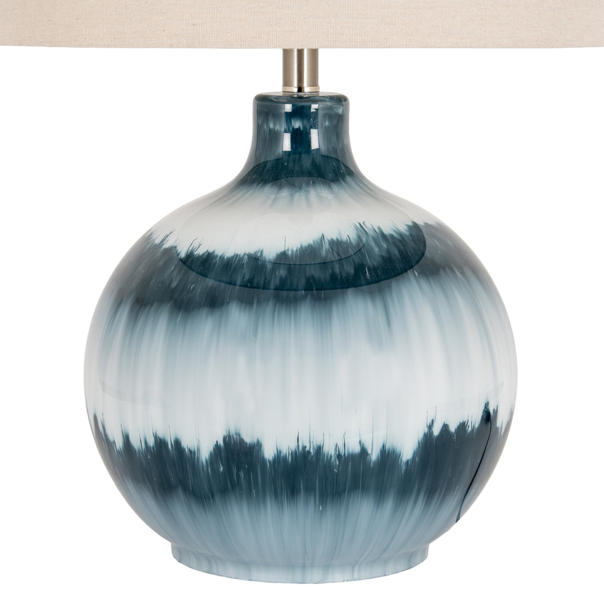 Close-up of the lamp's glossy blue body, showing feathered dark teal bands, pale translucent areas and fine vertical streaks beneath the shade.