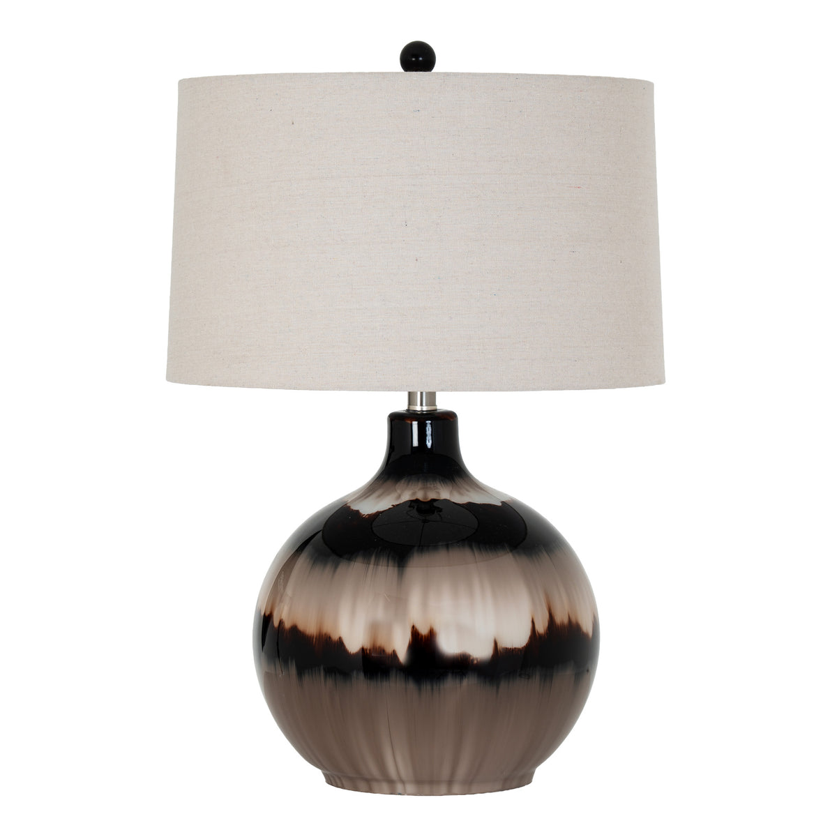 Table lamp on white with a glossy rounded taupe, cream and near-black banded body, pale tapered shade and dark ball finial.