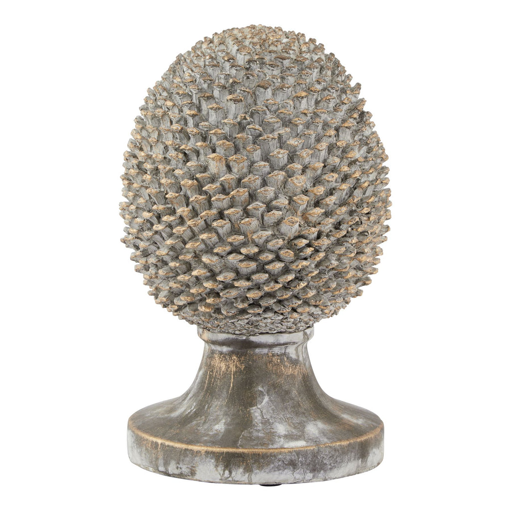 Upright oval pinecone ornament with grey-white layered scales and golden highlights on a wide, flared circular pedestal.