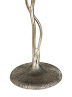 Detail of the twisting gold-coloured stem meeting a circular base with radiating ridges.