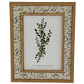 Front view of the Leafprint Doubletrim photo frame with warm wood-tone edges, a pale leaf-patterned border and a botanical insert marked 5 × 7 inches.