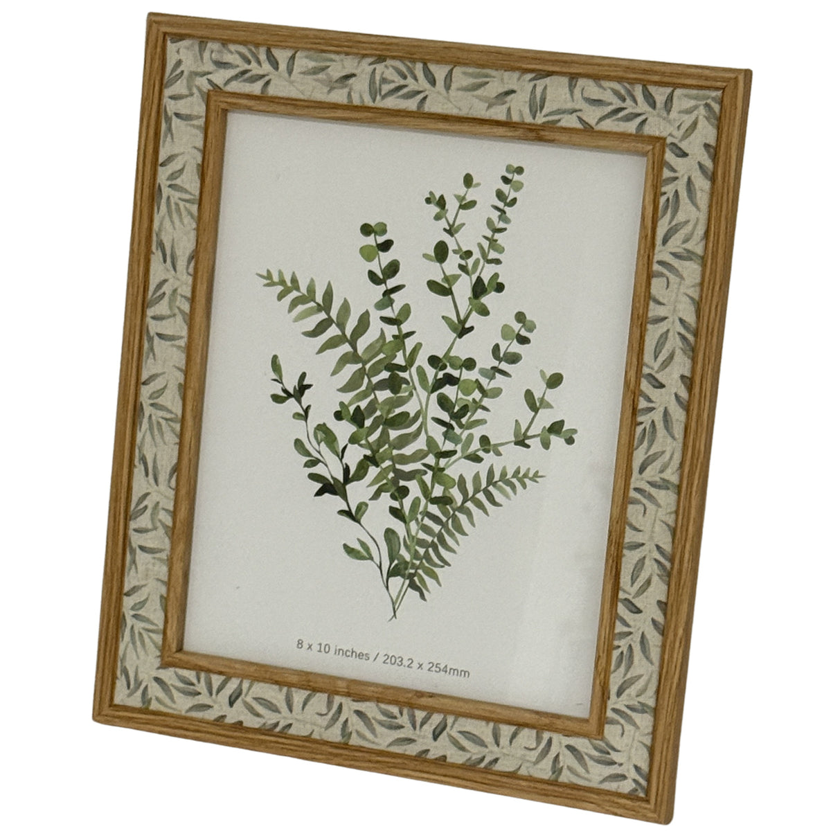 Angled portrait view of the leaf-patterned photo frame, showing its inner and outer trim around a botanical placeholder marked 8 × 10 inches / 203.2 × 254mm.