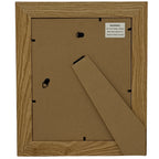 Rear view of the photo frame showing a brown back panel, fold-out stand, two hanging loops and a product label warning against placement above or near a heat source.