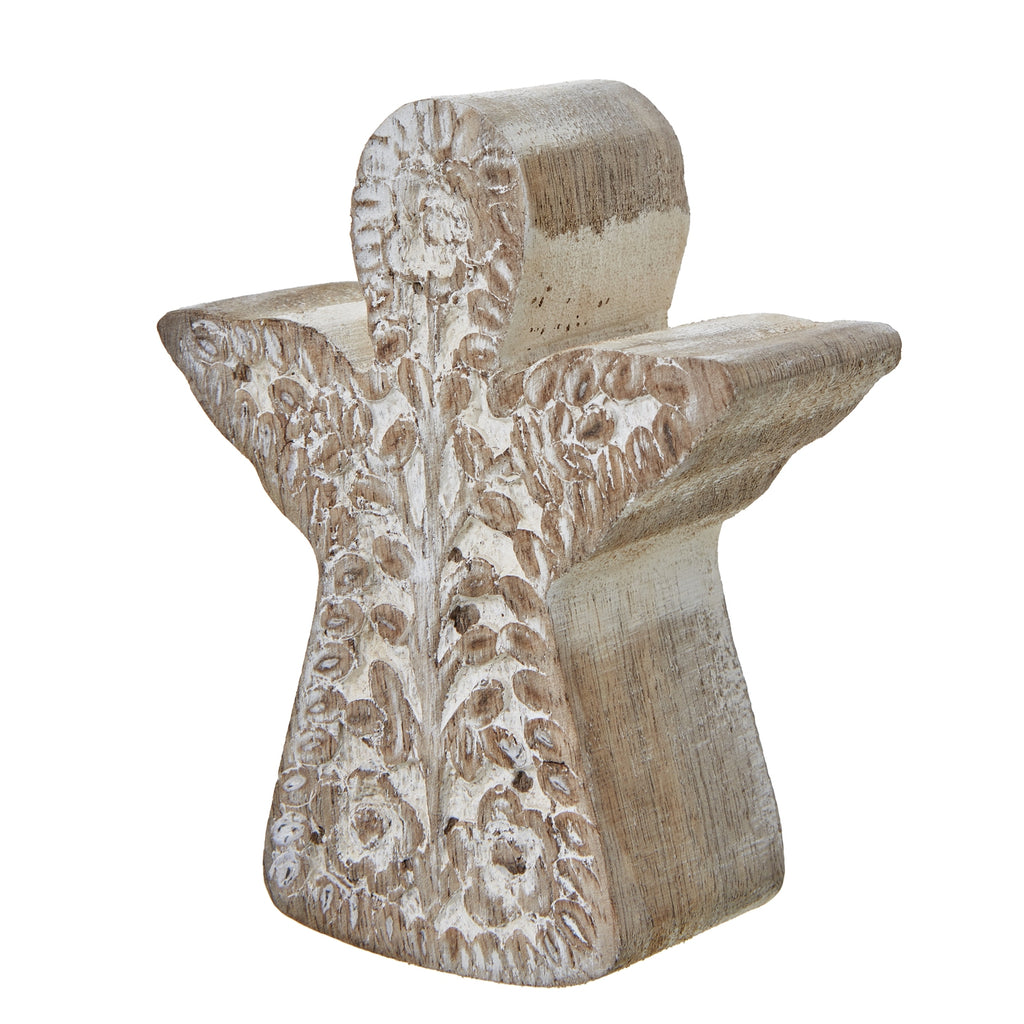 Angled view of the brown and white angel decoration, showing its floral relief front and thick sides.