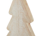 Angled close-up of the tree decoration's upper leaf pattern and broad tan border, showing the thickness of the stepped outline.
