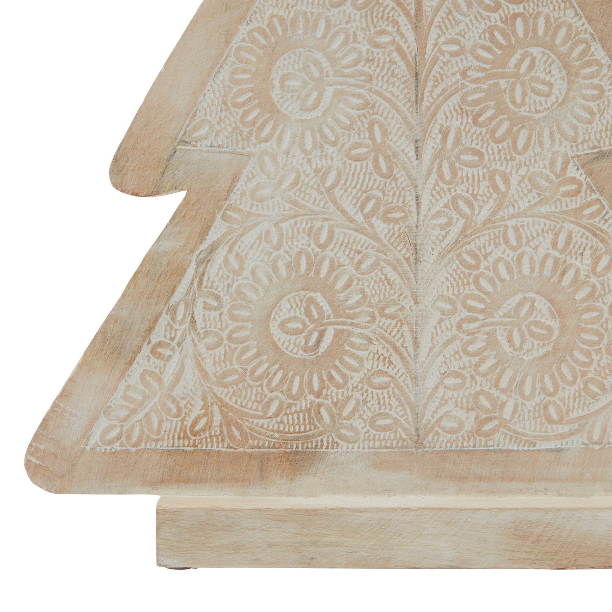 Close-up of the tree decoration's lower section, showing curled leaf motifs, fine pale lines, the plain border and rectangular foot.
