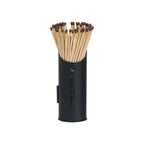 Black cylindrical matchstick holder shown with matches, with MATCHES spelled vertically down the front.